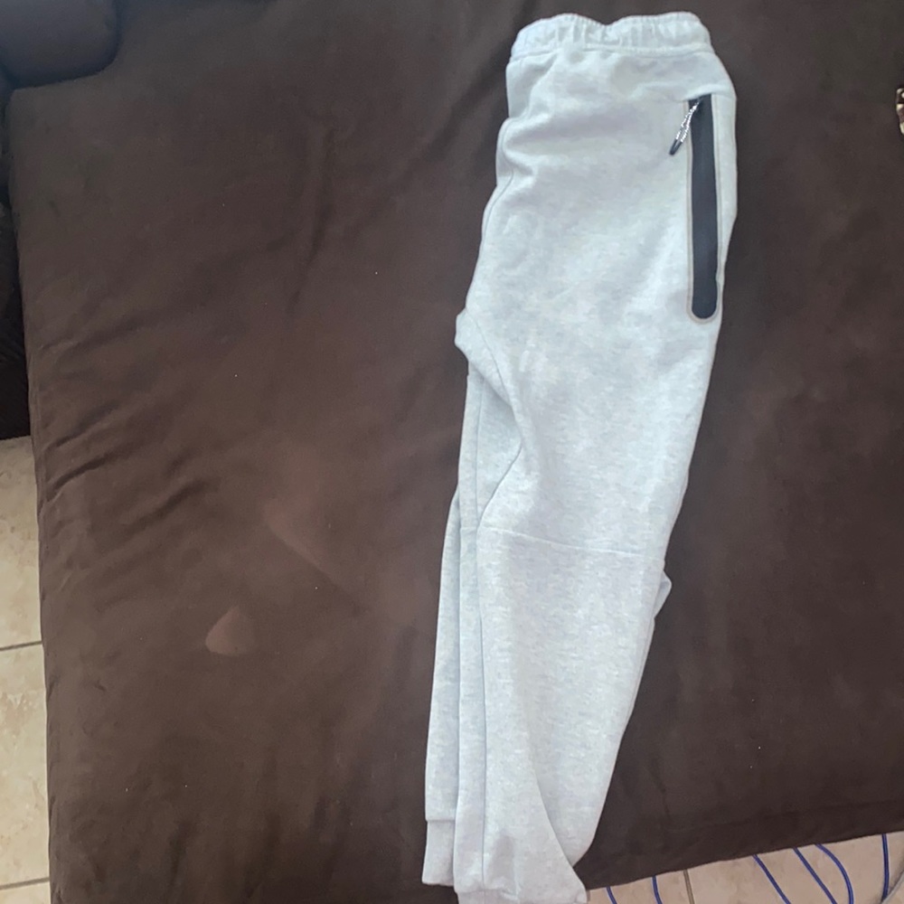 Gray Nike track sweatpants